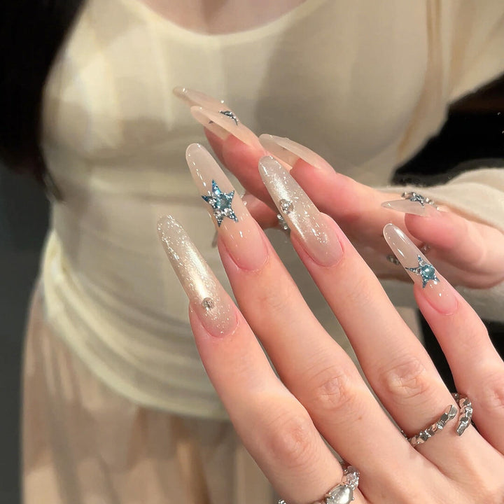 Glamorous artificial nails with star accents Bowlift