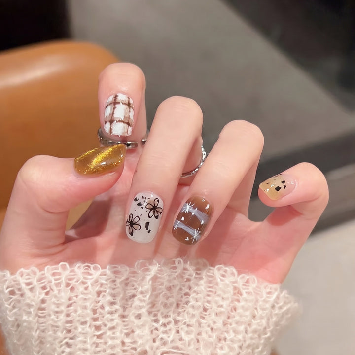 Artistic Press-On Nail Set with Unique Design Elements Bowlift