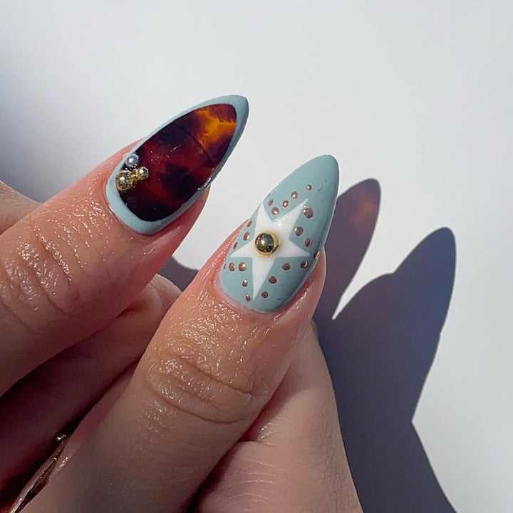 Artistic Press-On Nail Art Set with Unique Gemstone Accents Bowlift
