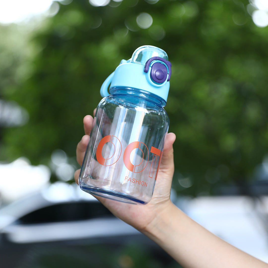 Women's transparent sports water bottle with practical Bowlift attachment