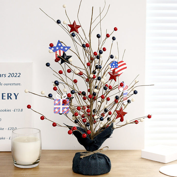 Unisex rustic table arrangement with star and berry branches as focal decoration Bowlift
