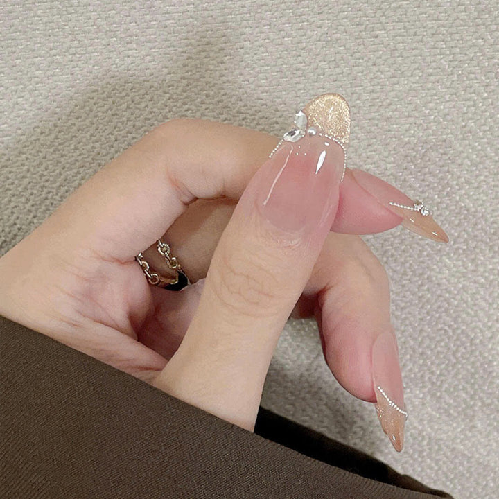 Elegant Stiletto Press-On Nails with Gemstone Accents Bowlift