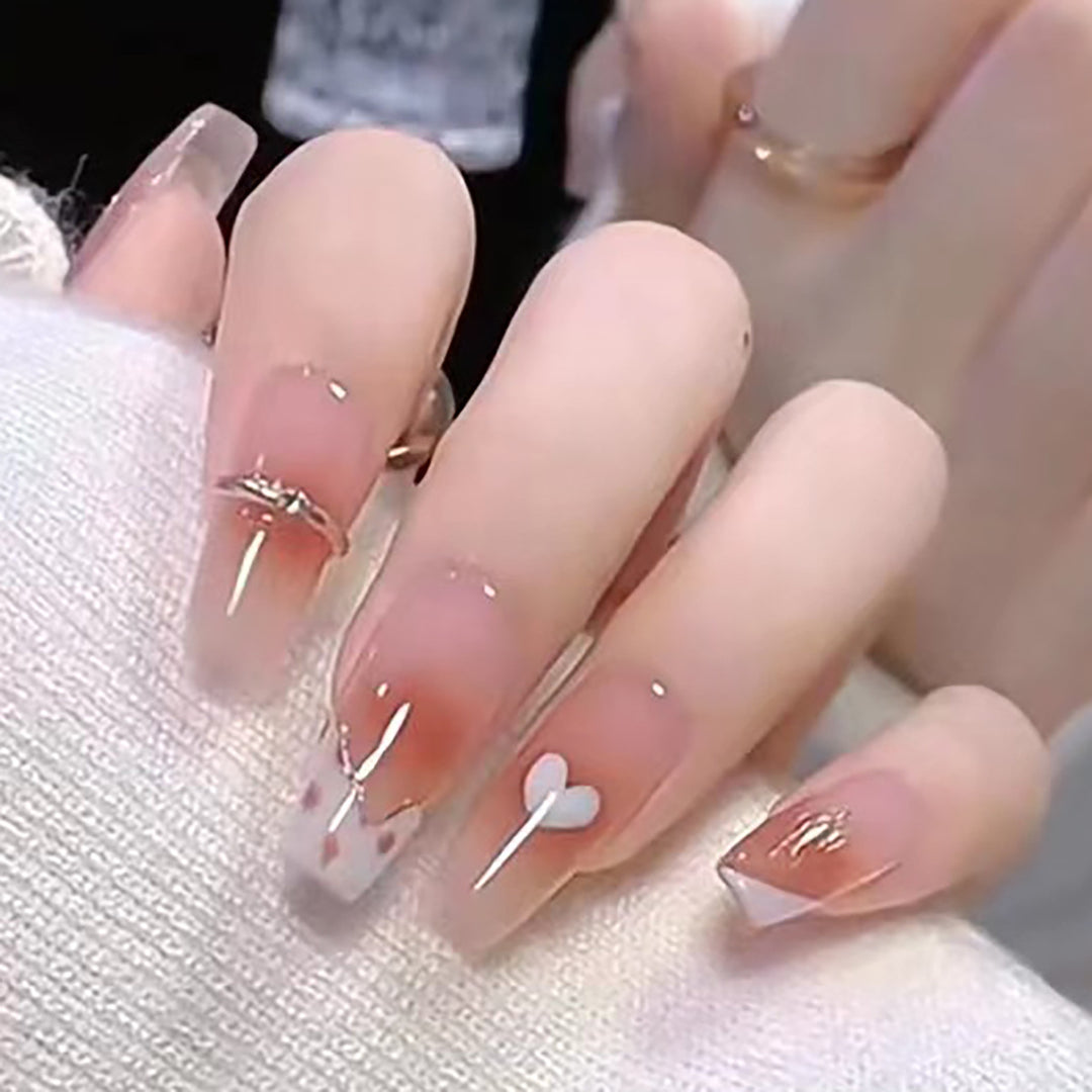 Elegant Long Press-On Nails with Artistic Heart and Gem Accents Bowlift