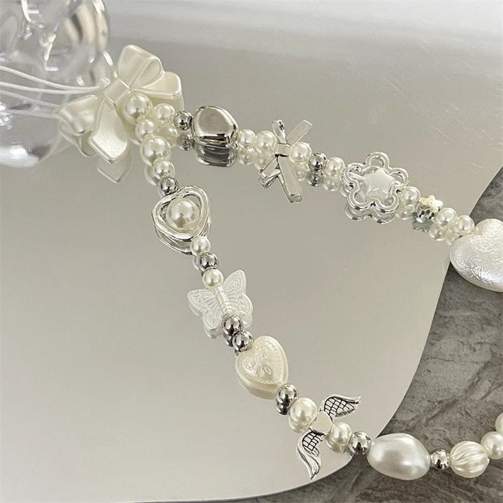 Heart and Butterfly Charm Beaded Bracelet Bowlift