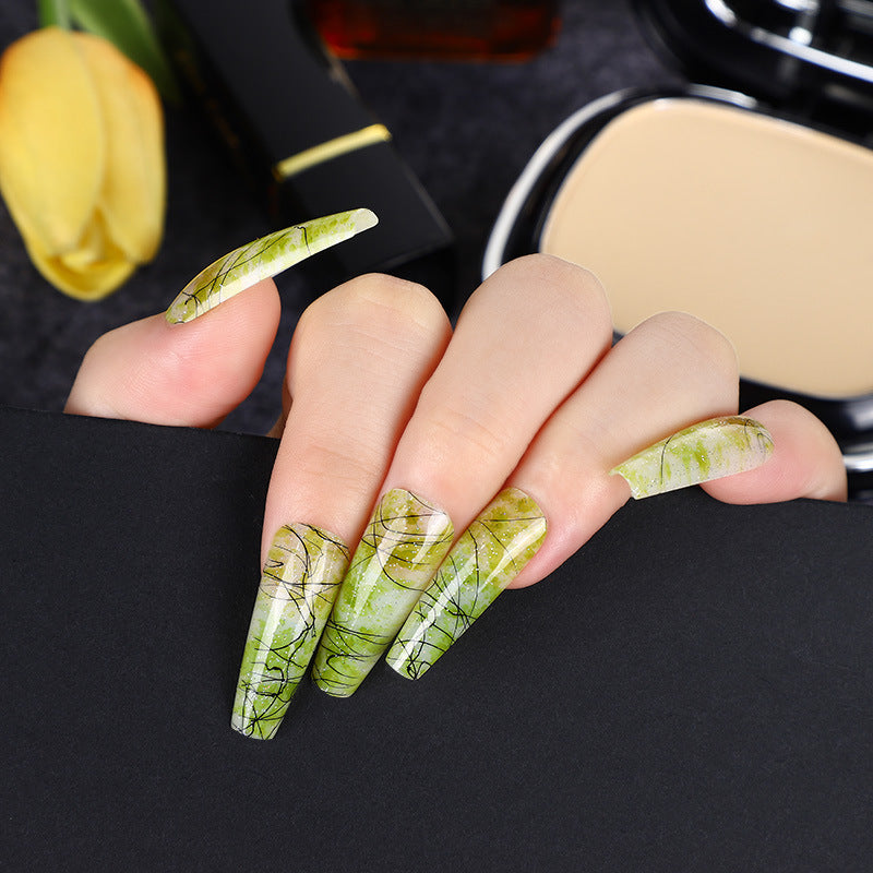 Creative nail art with blood splatter design Bowlift