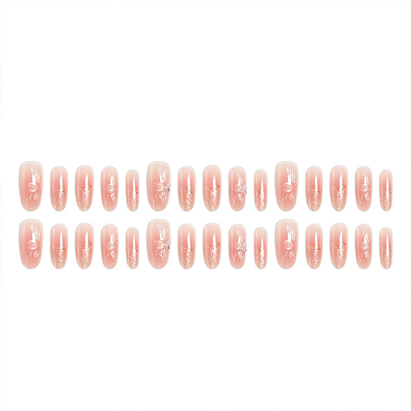 Acrylic nail set with filigree flower and glitter elements Bowlift