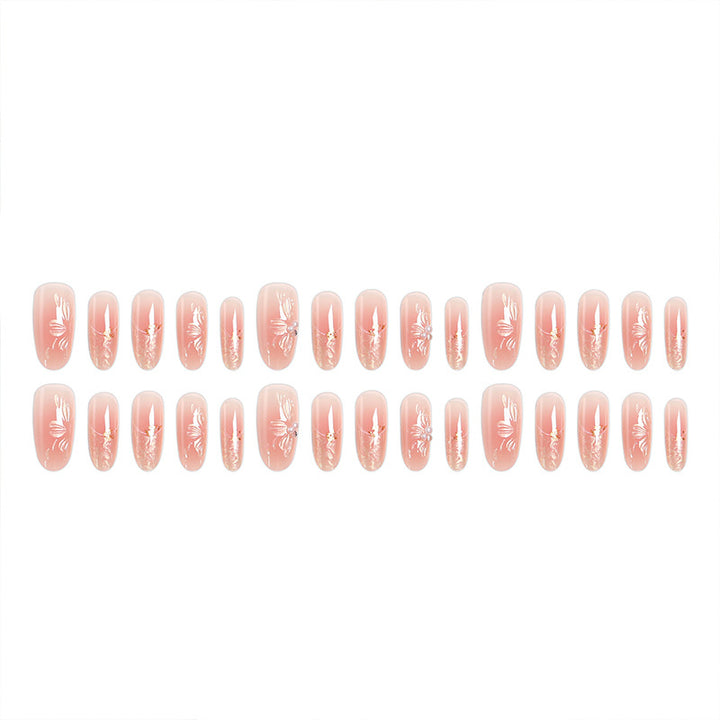 Acrylic nail set with filigree flower and glitter elements Bowlift
