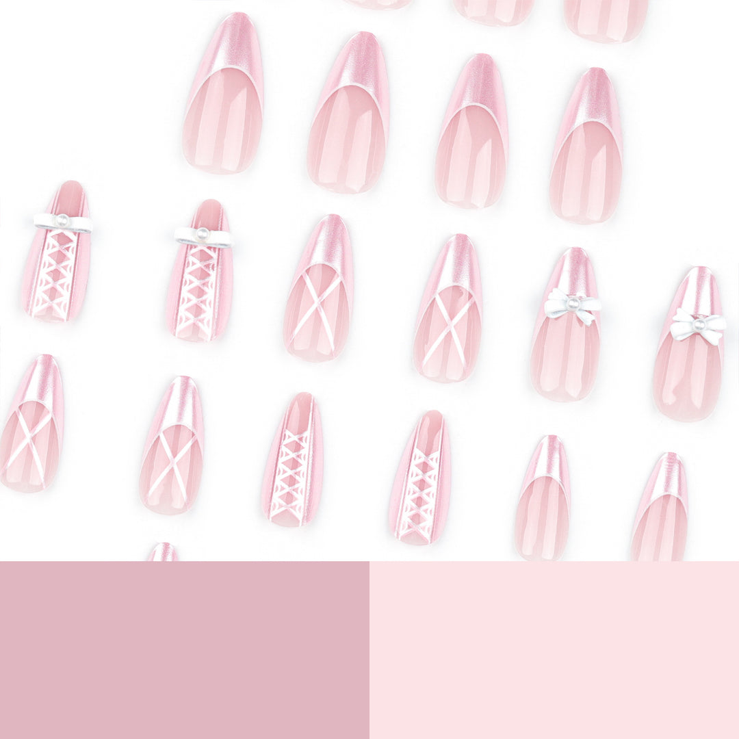 Artistic stiletto nails with elegant pearl and bow accents Bowlift