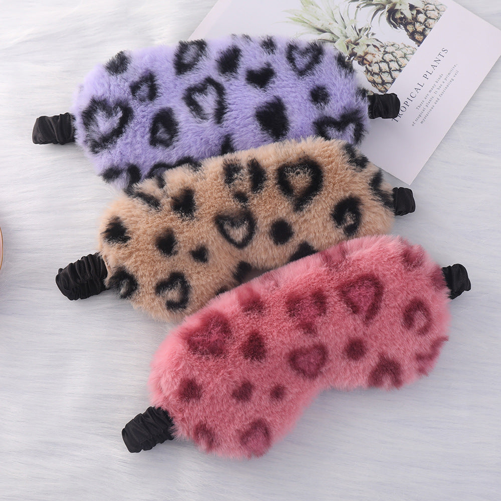 Women's cuddly faux fur sleep mask with heart-embossed surface and gathered comfort band Bowlift