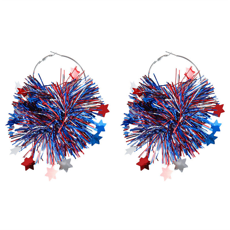 Women with eye-catching pompom hoops with lametta tassels and lightweight wire closure Bowlift