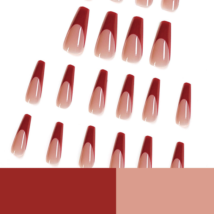 Elegant artificial nails with high-gloss finish and prominent French tip Bowlift