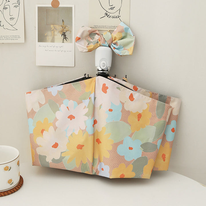 Ladies folding umbrella with creative floral pattern and automatic opening mechanism Bowlift