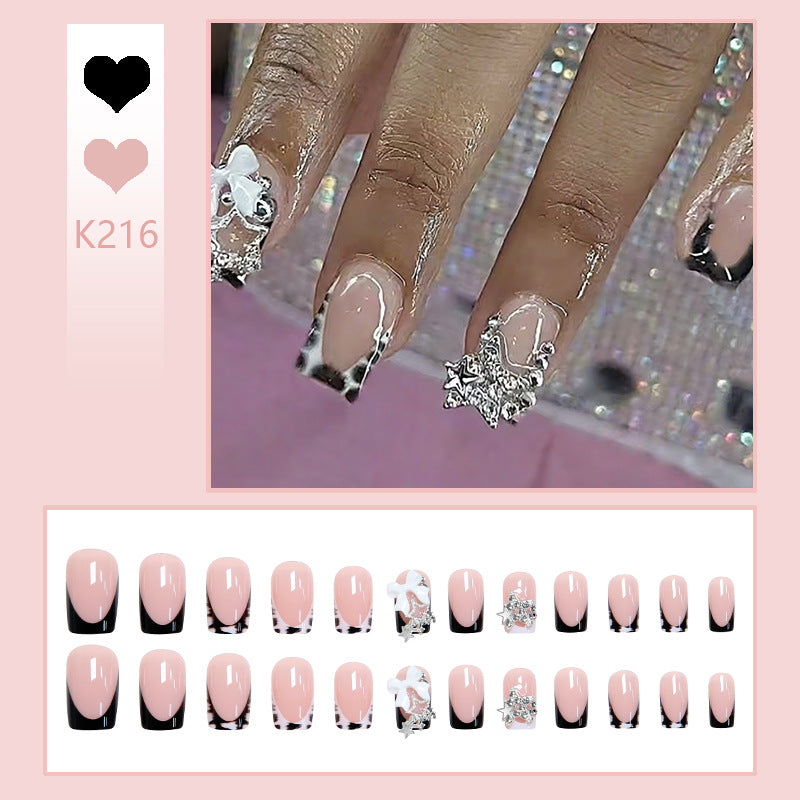 Acrylic nail set with glamorous starlights and elegant embellishments Bowlift