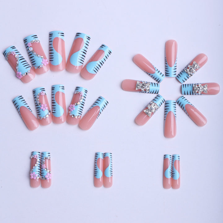 Artificial nails with elaborate decorations Bowlift