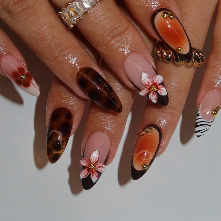 Artistic Press-On Nail Set with Floral Accents Bowlift