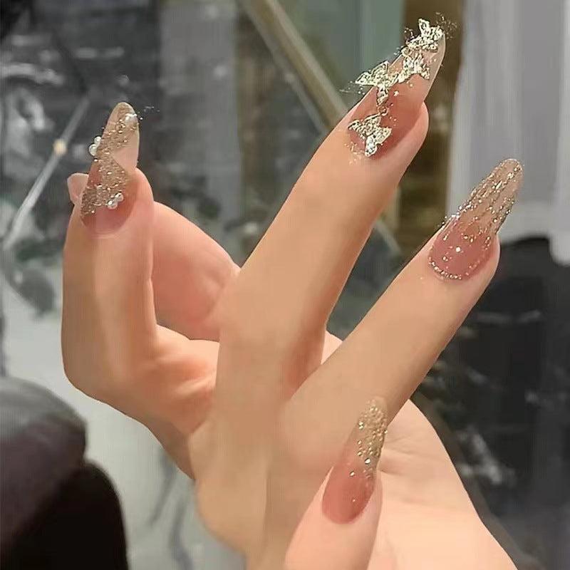 Glamorous artificial nails with sparkling accents Bowlift