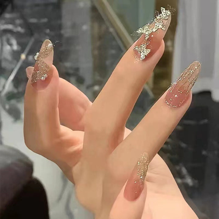 Glamorous artificial nails with sparkling accents Bowlift