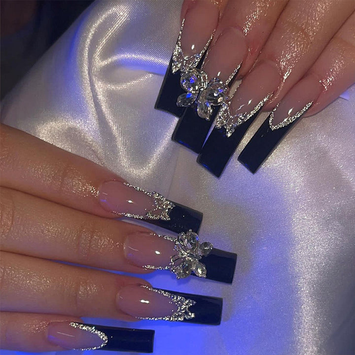Glamorous artificial nails with rhinestone and butterfly elements Bowlift