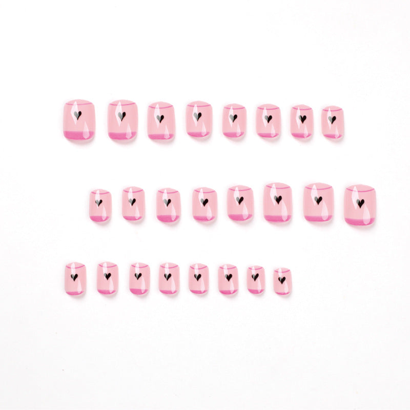 Creative Nail Art with Heart Design and Glitter Accents Bowlift