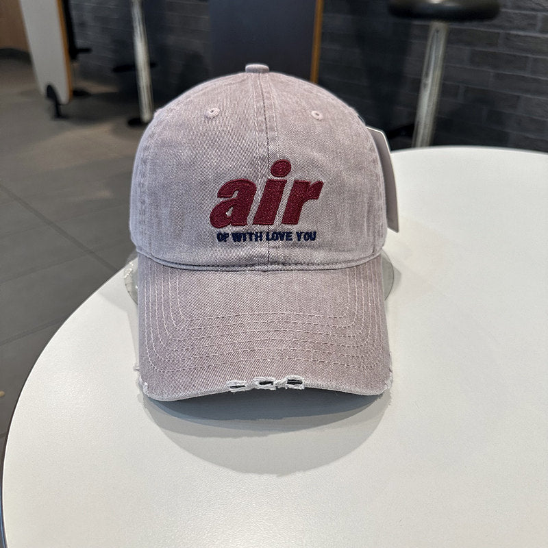 Distressed Denim Baseball Cap with Unique Embroidery
