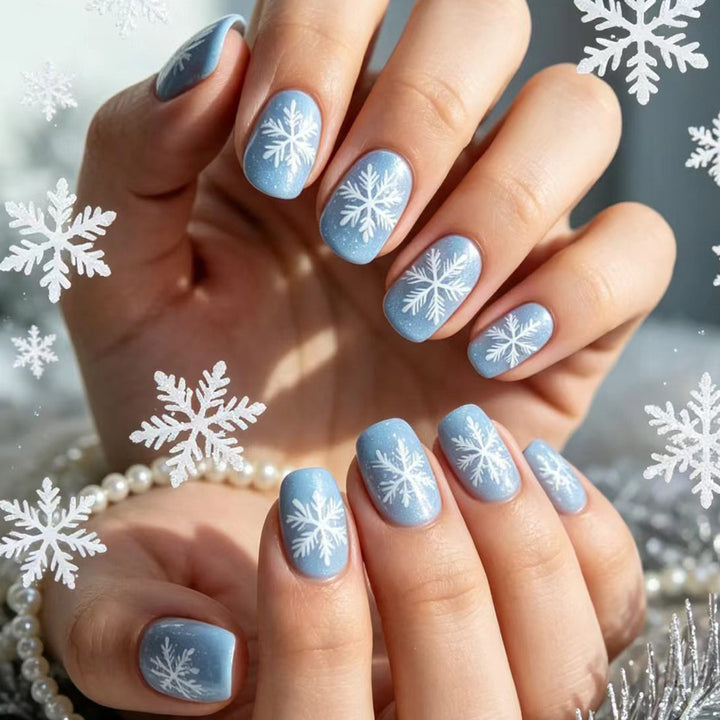 Artificial nails with sparkling winter flake design Bowlift