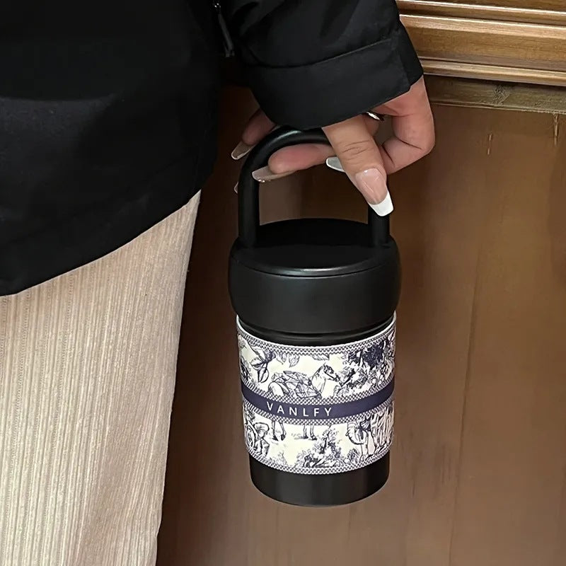Women's stylish thermos cup with practical carrying handle Bowlift