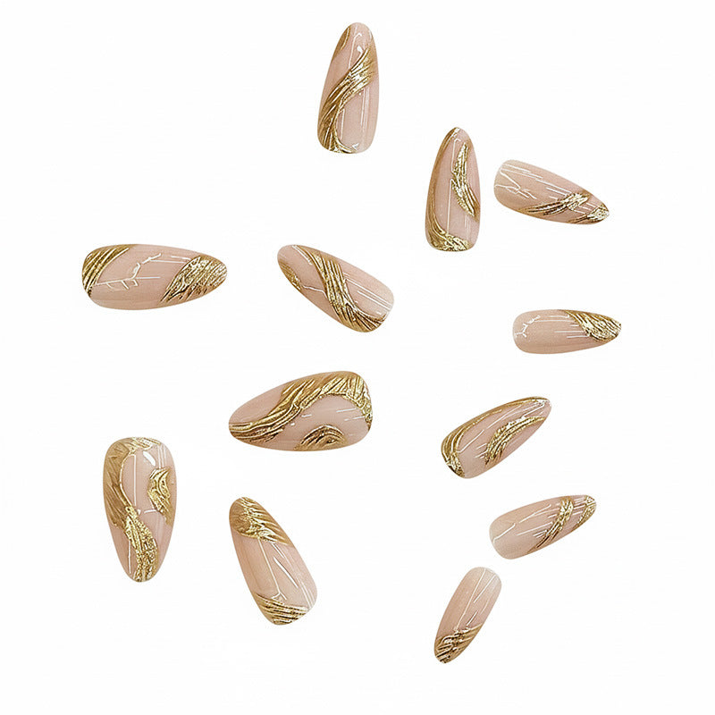 Artistic Press-On Nail Set with Gold Swirl Design Bowlift