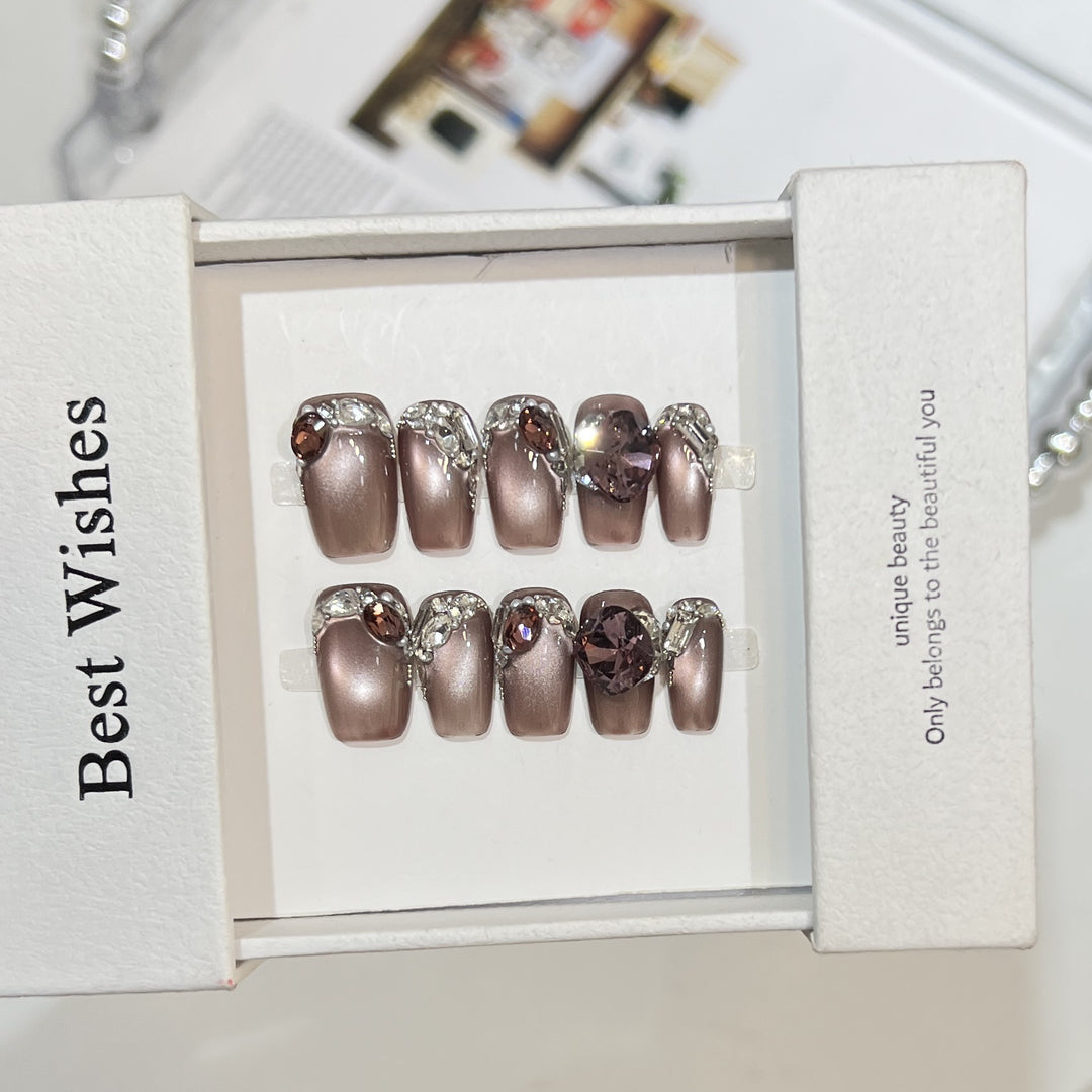 Decorative Press-On Nail Design with Gemstone Accents Bowlift