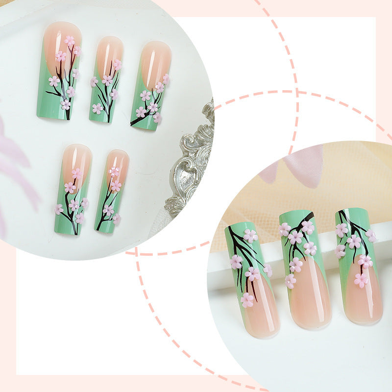 Artificial nail set with delicate flower and natural tones Bowlift