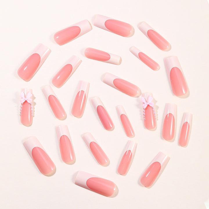 Elegant Stiletto Nail Art Extensions with Pearl and Bow Accents Bowlift