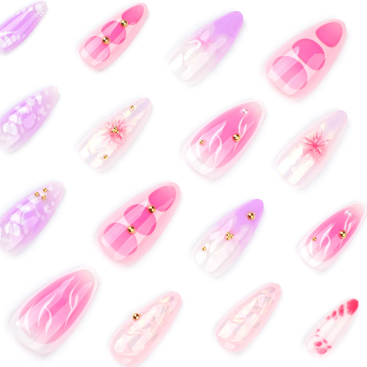 Artful Nail Extensions with Floral Patterns and Rhinestone Embellishments Bowlift
