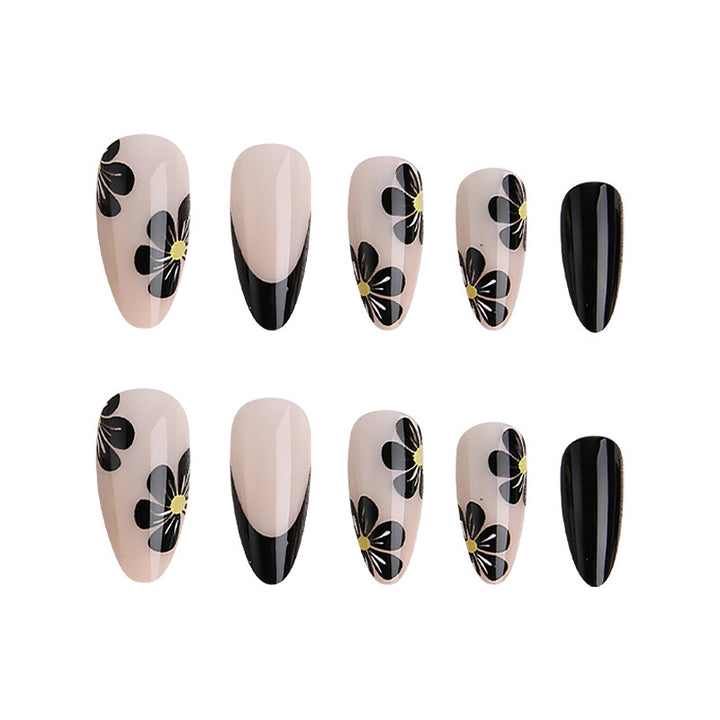 Elegant nail tips with floral accents Bowlift