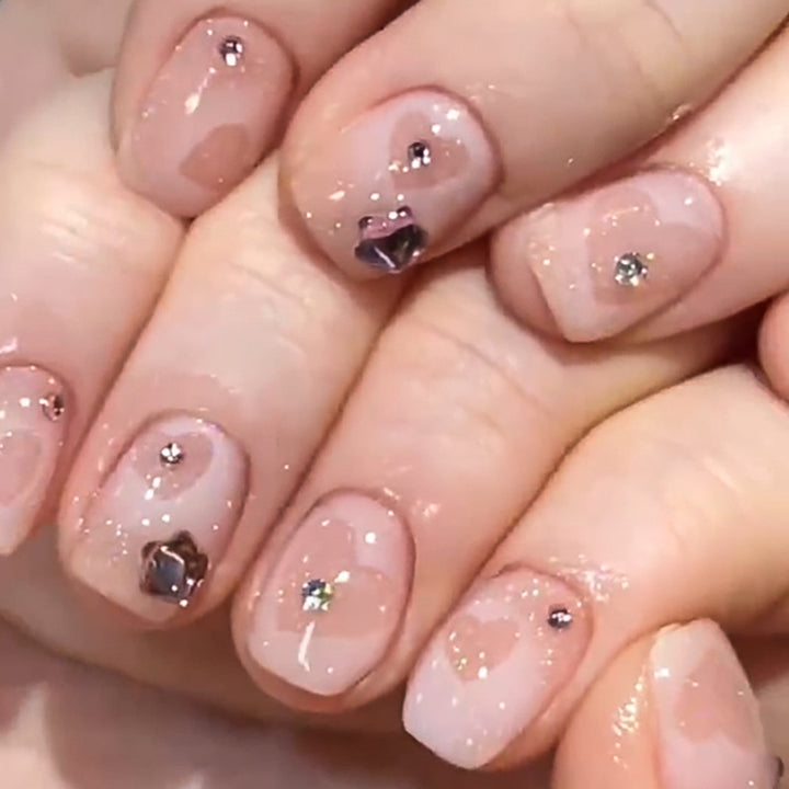 Artistic Nail Art with Glitter and Heart Designs Bowlift
