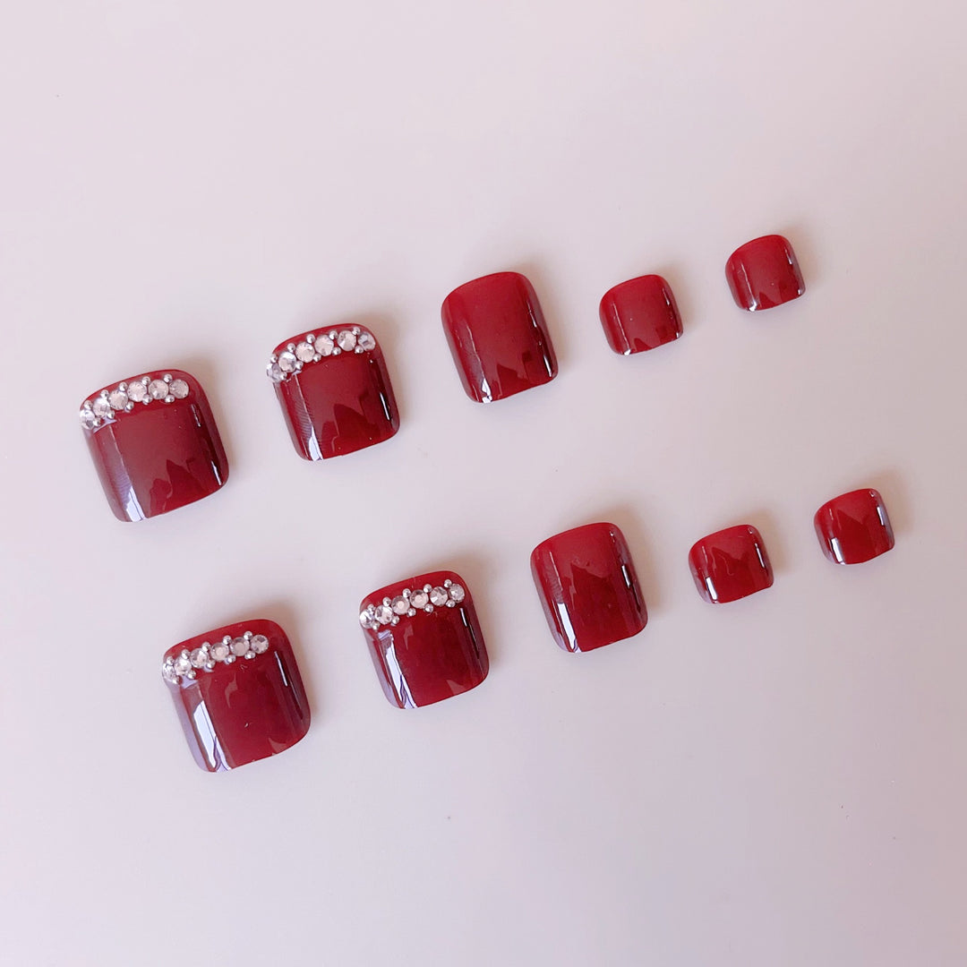 Acrylic nail set with elegant nail art and sparkle elements Bowlift