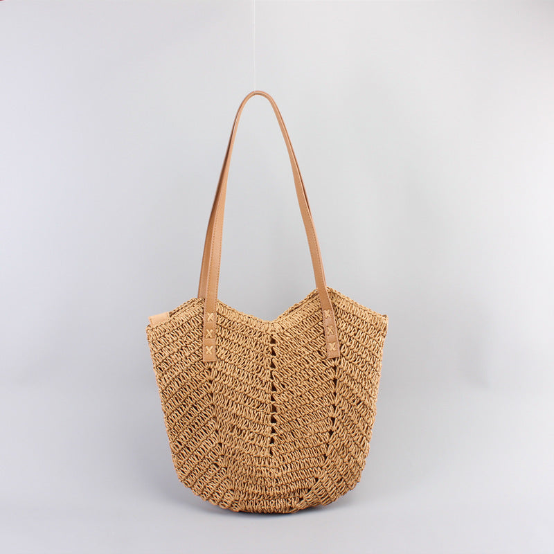 Casual bag made of handwoven straw with wide leather handles Bowlift