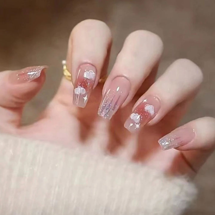 Artistic Nail Art with Glitter and Flower Applications Bowlift