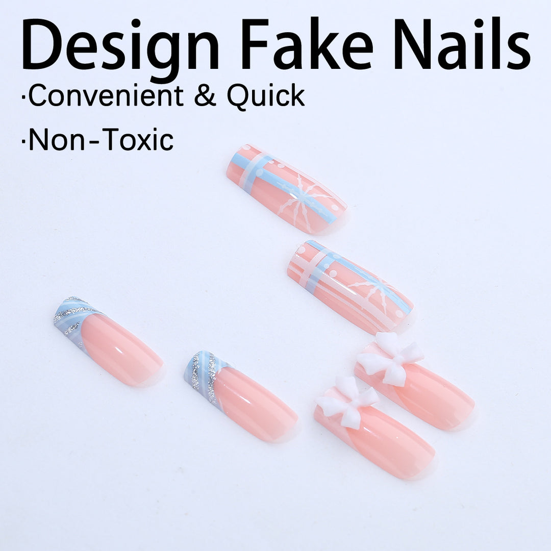 Artificial nail set with winter snowflake and bow motifs Bowlift