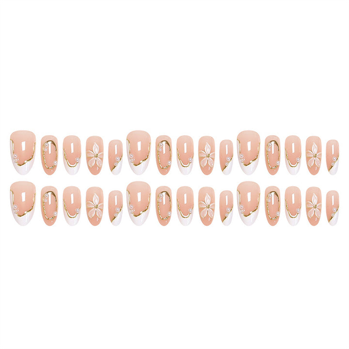 Artistic nail tips with elegant pearl design Bowlift