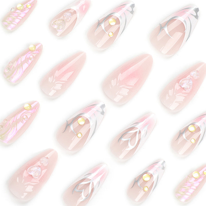 Artful nail extensions with two-dimensional design and glitter accents Bowlift
