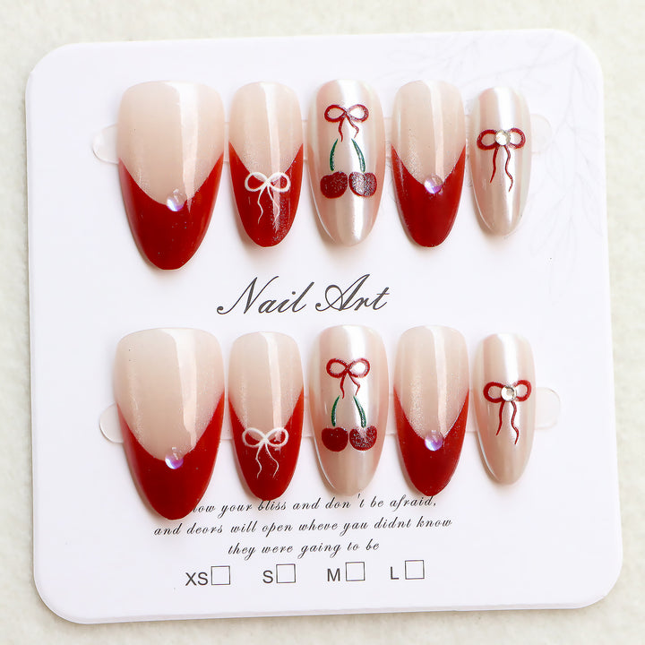 Artistic Press-On Nail Set with Cherry and Ribbon Design Bowlift