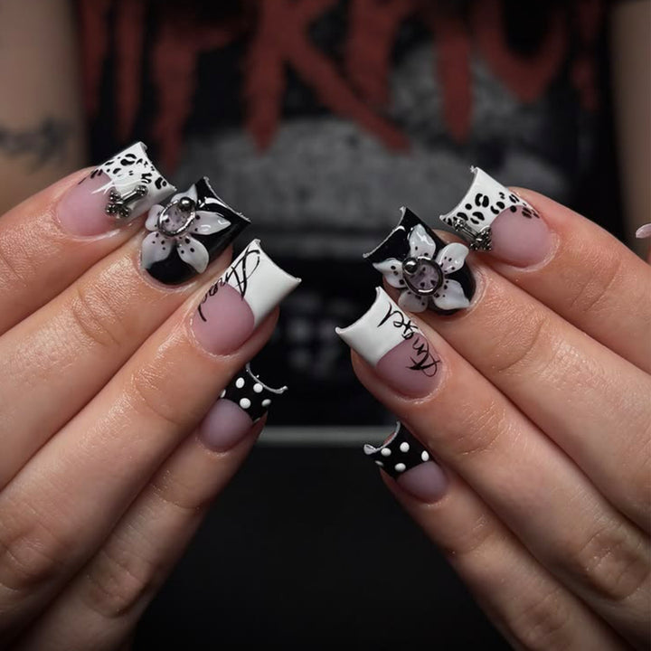 Artful nail extensions with elegant black-and-white design Bowlift