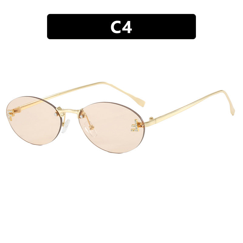 Women's fashionable sunglasses with elegant, round lenses and delicate metal frame Bowlift