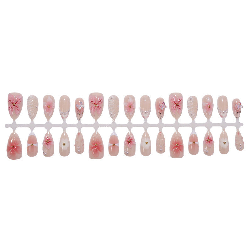Creative nail art set with delicate flower and glitter embellishments Bowlift