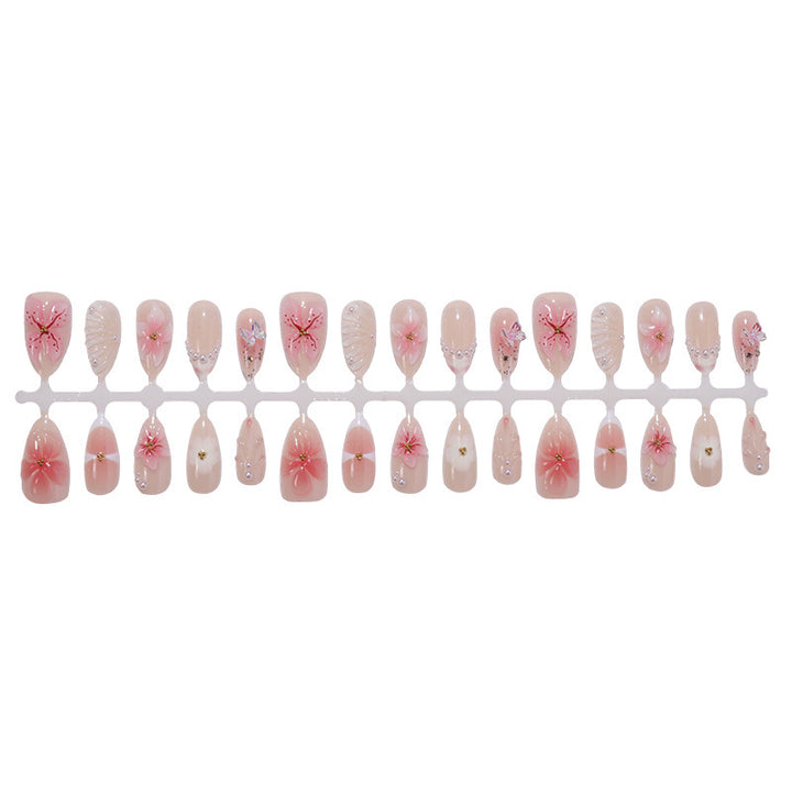Creative nail art set with delicate flower and glitter embellishments Bowlift