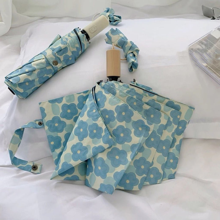 Women Folding Umbrella with Floral Pattern Bowlift