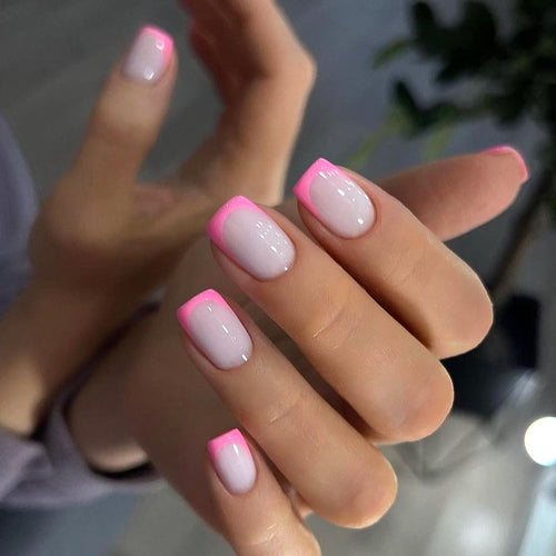 Artful nail design with elegant French tip and modern accents Bowlift