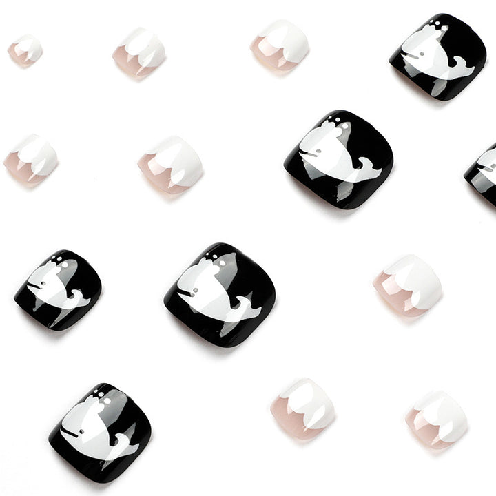 Artful toenail art with a moody whale motif Bowlift