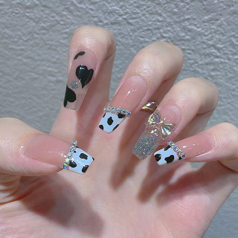 Cow Print Press-On Nails with Bow and Glitter Accent Bowlift