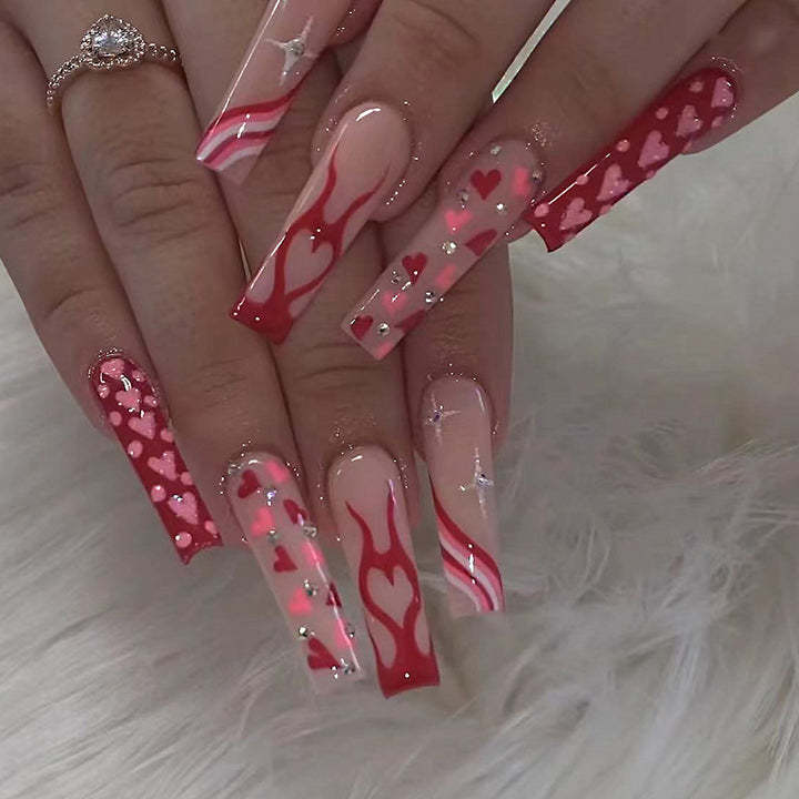 Artful Nail Art with Hearts and Glitter Accents Bowlift