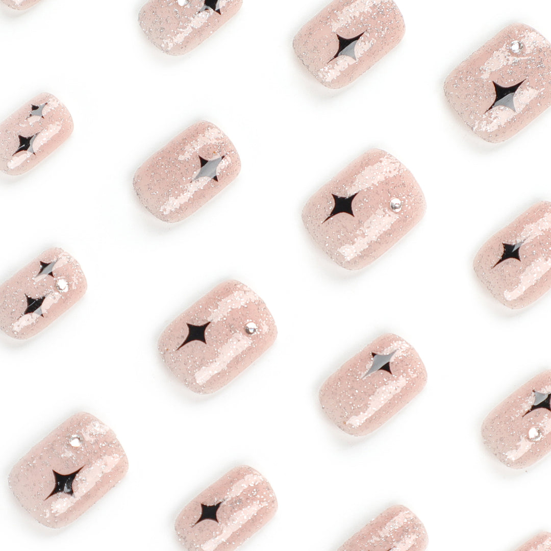Artful Nail Extensions with Glitter and Star Pattern Bowlift